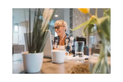 Businesswoman using HR software for medium business workforce management