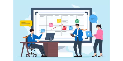 Equipe développant la planification avec des notes autocollantes sur tableau blanc